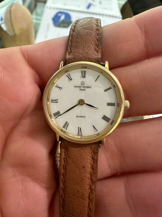 Montre Michel Herbelin Paris à bracelet cuir, réparée à l'Atelier Baratte